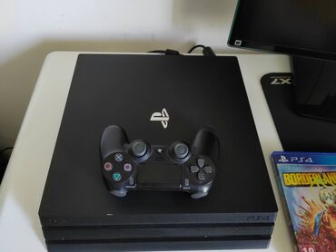 ajfon 13: Konzola Sony Playstation 4 PRO  od 1Tb, puna instaliranih igrica