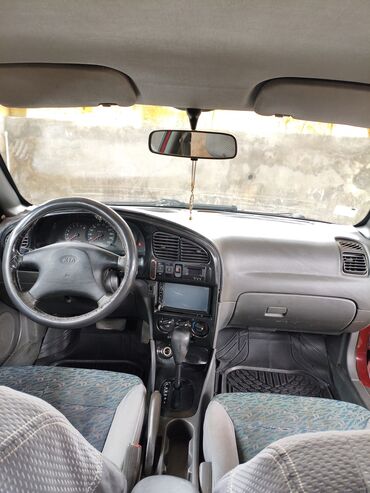 Kia: Kia Sephia: 1.6 l | 1998 il Sedan — 12