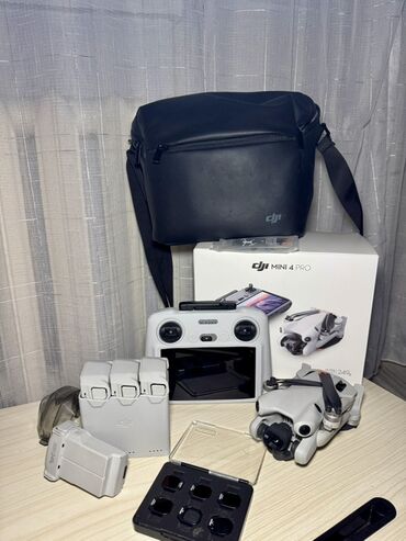 домашний кинотеатр проектор: DJI Mini 4 Pro Fly More Combo (с пультом DJI RC 2 с экраном)