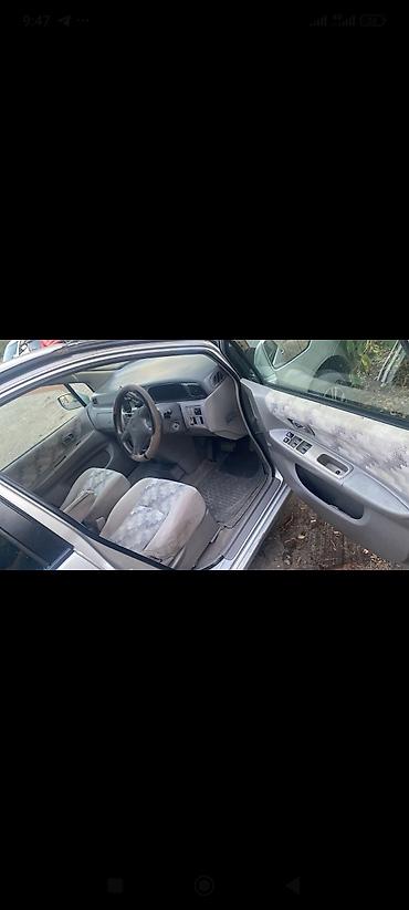 калганы: Nissan Liberty: 2000 г., 2 л, Вариатор, Вэн/Минивэн — 3
