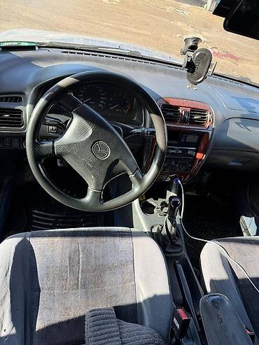 обмен на частный дом: Mazda 626: 1999 г., Бензин, Универсал — 9