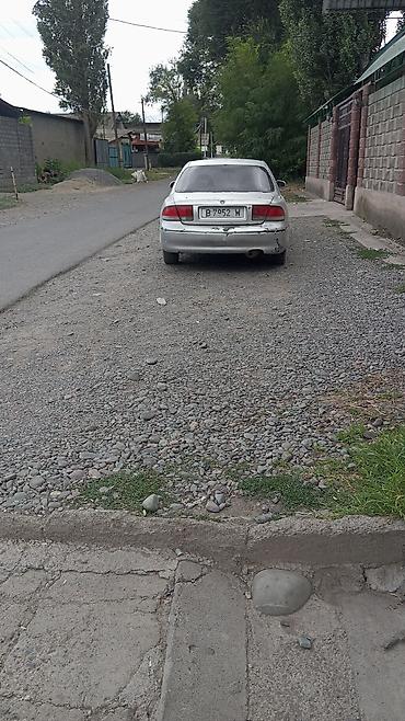ровер 400: Mazda 626: 1993 г., Механика, Седан — 1