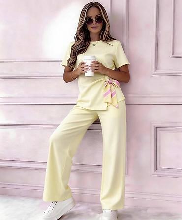 Kompleti: ✨Prelep komplet – majica i pantalone sa širokom nogavicom ✅3000 Din S — 7