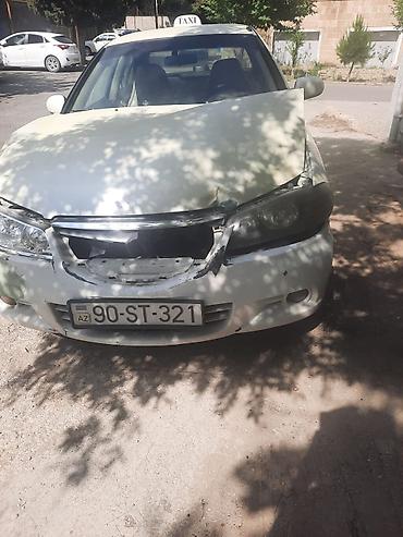 2 5 dizel mator: Nissan Sunny: 1.3 l | 2006 il Sedan — 3