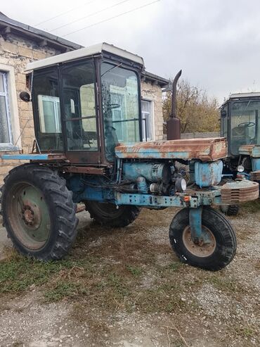 Traktorlar: Kənd təsərrüfatı üçün tək kabinalı təkərli traktor Xüsusiyyətlər: - — 8