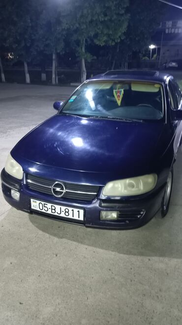 şinlər və təkərlər 185 70 14: Opel Omega: 2 l | 1998 il Sedan