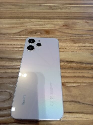 телефон нот9: Xiaomi, Redmi 12, Б/у, 256 ГБ, цвет - Серебристый, 2 SIM
