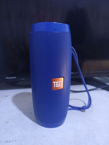 сдма телефон: Компактная беспроводная колонка T&G в синем корпусе. Оснащена