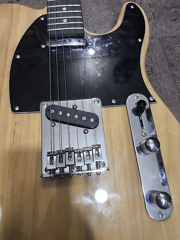 gitara klassik: Elektrik gitara – Telecaster tipli korpus - Korpus: təbii ağac — 4