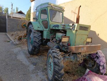 Трактор с прицепными граблями-ворошилками (колёсного типа). Основные