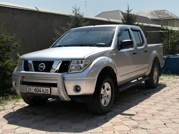 грузовой автомобиль: Nissan Navara: 2006 г., 2.6 л, Механика, Дизель, Пикап