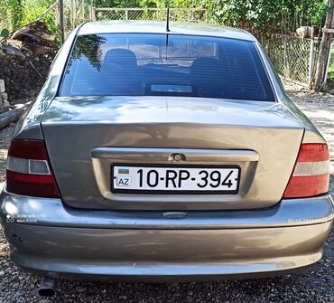 masın rolu: Opel Vectra: 1.6 l | 1996 il | 530000 km Sedan