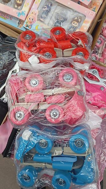 Roliklər: Uşaq üçün tənzimlənən dörd təkərli rollers (kvadro-roller) dəsti. - — 1