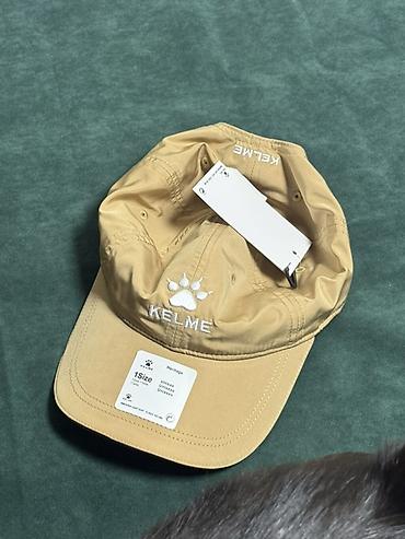 одежд: Кепка KELME Heritage, унисекс - Цвет: бежевый (песочный) - Логотип — 1