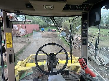 Кормоуборочные комбайны: Самоходный кормоуборочный комбайн John Deere 6610 - Назначение — 12