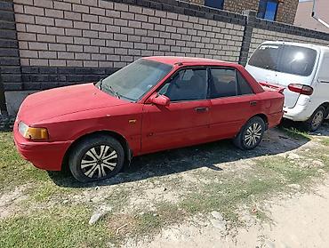 Mazda Familia: 1992 г., 1.6 л, Механика, Бензин, Седан