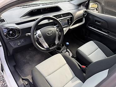 Toyota: Toyota Prius C: 2016 г., 1.5 л, Автомат, Гибрид, Хэтчбэк — 4