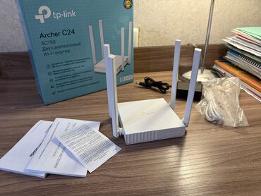 Модемы и сетевое оборудование: Wi-Fi роутер TP-Link Archer C24 AC750 — это компактное и