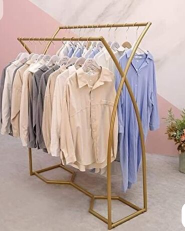 Mağaza asılqanları: Paltar asmaq üçün nəzərdə tutulmuş metal konstruksiyalı asılqan. Bu — 4