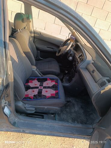 машину в расрочку: Mazda 323: 1994 г., 1.5 л, Автомат, Бензин, Седан