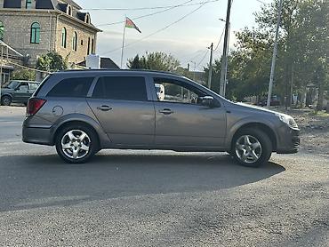 mesok satisi: Opel Astra H Caravan (universal) – boz rəngdə, 5 qapılı — 7