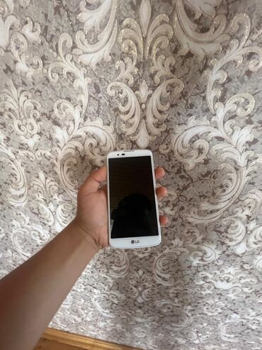 LG K10, 16 ГБ, цвет - Белый, Сенсорный