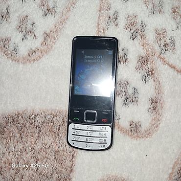 Mobil telefonlar: Jinga düyməli mobil telefon Xüsusiyyətlər: - İki SIM dəstəyi (ekranda — 2
