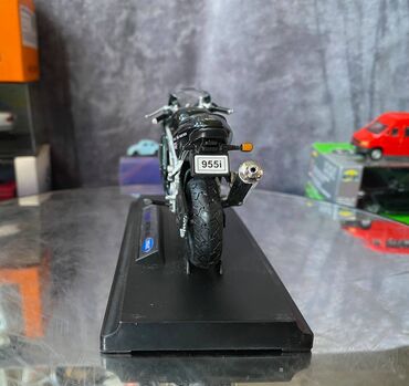 Avtomobil modelləri: Коллекционная модель Triumph Daytona 955i dark Green 1997 Welly Scale — 11