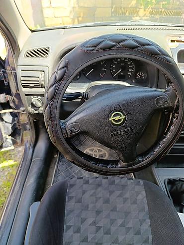 opel astra 2015: Opel Astra Caravan (universał) – tünd mavi rəng, 5 qapı, geniş baqajlı — 9