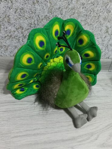 Oyuncaqlar: Dinozavr ~35 sm Ördək ~25 sm Tovuz quşu ~ 20sm Tutuquşu ~ 20 sm — 4