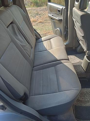 nissan note bufer: Nissan X-Trail (T30) – gümüşü rəngli, benzinlə çalışan kompakt SUV — 8