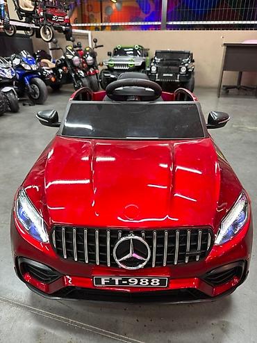 Детский транспорт: Детский электромобиль Mercedes-Benz в красном цвете. Этот стильный — 5