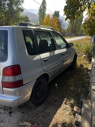 e 55 amg: Mazda Demio: 1997 г., 1.5 л, Автомат, Универсал — 4