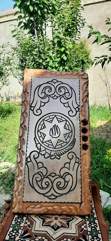 Nərdlər: Əl işi olan bu taxta nərd dəsti özəl dizaynı ilə diqqət çəkir. Naxışlı — 17