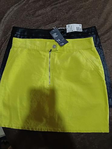 Suknje: Dve ženske mini suknje + torbica plus šorc - Crna mini suknja od — 3