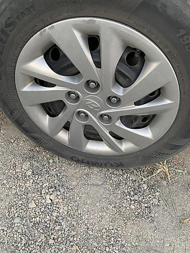 Колпаки: Комплект оригинальных колпаков Hyundai на стальные диски. - Диаметр — 2