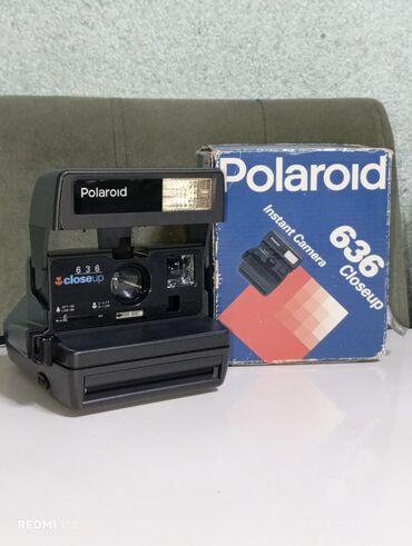 Polaroid fotoparat 
işlədilməyib hədiyyə verilib