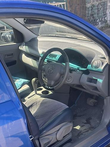 мисубиси спейс стар: Mazda Demio: 2002 г., Автомат, Бензин, Хэтчбэк — 4