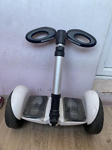 devo tiko: Гироскутер с рулями/колонкой управления (тип mini‑segway) — 1