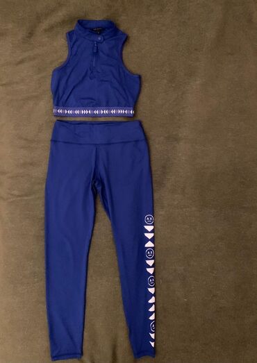 İdman formaları: Armani Exchange brendinə məxsus, göy rəngdə idman dəsti. Dəstə qısa