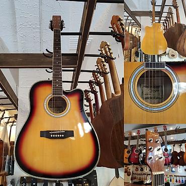 Gitaralar: Akustik gitara Smiger GAH 61 Üst: Şam ağacı Qol: Gül ağacı — 1