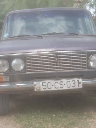 фольксваген поло седан 1 6: Avtomobil VAZ-2106 modeli, boz rəngdədir. Dörd qapılı sedan kuzova