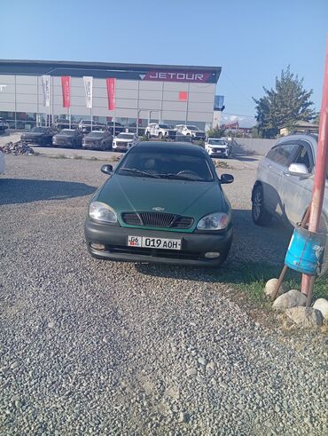 передний бампер ланос цена: Автомобиль Chevrolet Lanos в кузове седан, окрашенный в зеленый цвет