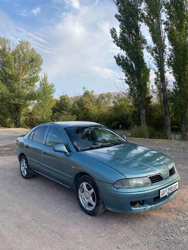 обмен дом на авто: Mitsubishi Carisma: 2003 г., 1.6 л, Механика, Бензин