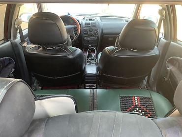 буу донголок chevrolet malibu шина: Mitsubishi Carisma: 1998 г., Седан — 5