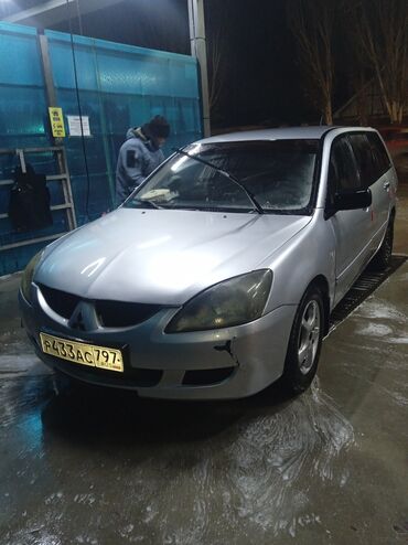 обшивка салона зил: Mitsubishi Lancer: 2005 г., 1.6 л, Механика, Бензин, Универсал