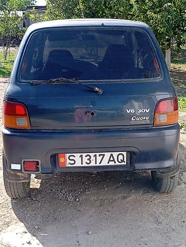 водный мото: Daihatsu Cuore: 1999 г., 0.8 л, Механика, Бензин, Хэтчбэк — 2