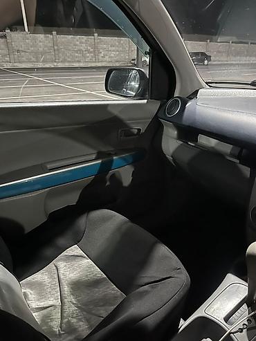 рул: Mazda Demio: 2002 г., 1.3 л, Автомат, Бензин, Хетчбек — 5