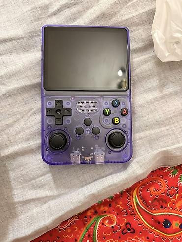 портативный консоль: Портативная игровая консоль R36S (фиолетовый полупрозрачный корпус) - — 3