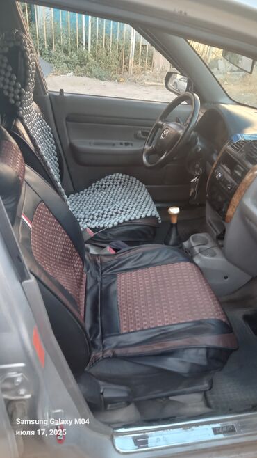 портерге шина: Mazda Demio: 2002 г., 1.5 л, Механика, Бензин, Хетчбек